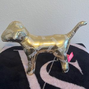 Pink mini dog,gold with logo print, new with no wear or damage